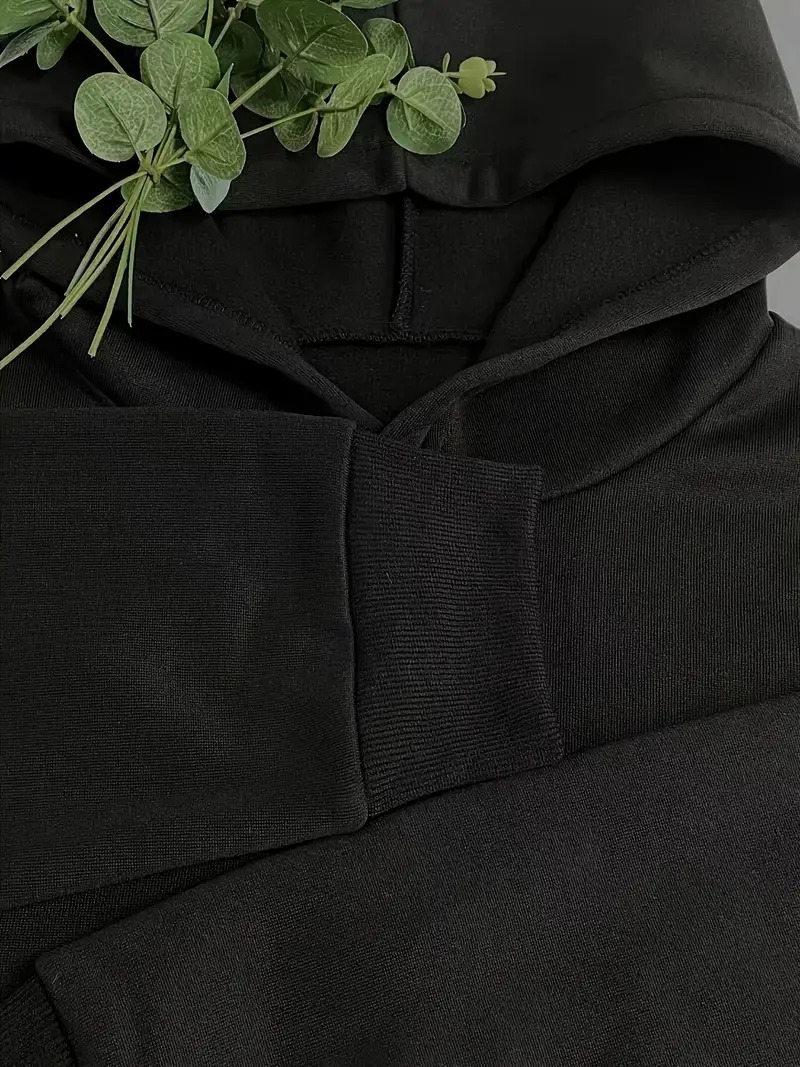 Sudadera con capucha negra de  - Winter Clothing Japan reseña y precio